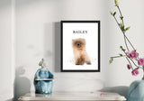 pet portrait of a fluffy brown puppy named Bailey displayed on a white wall with a ceramic figurine and pink flowers