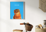 framed pet portrait of an orange cat named Ellie